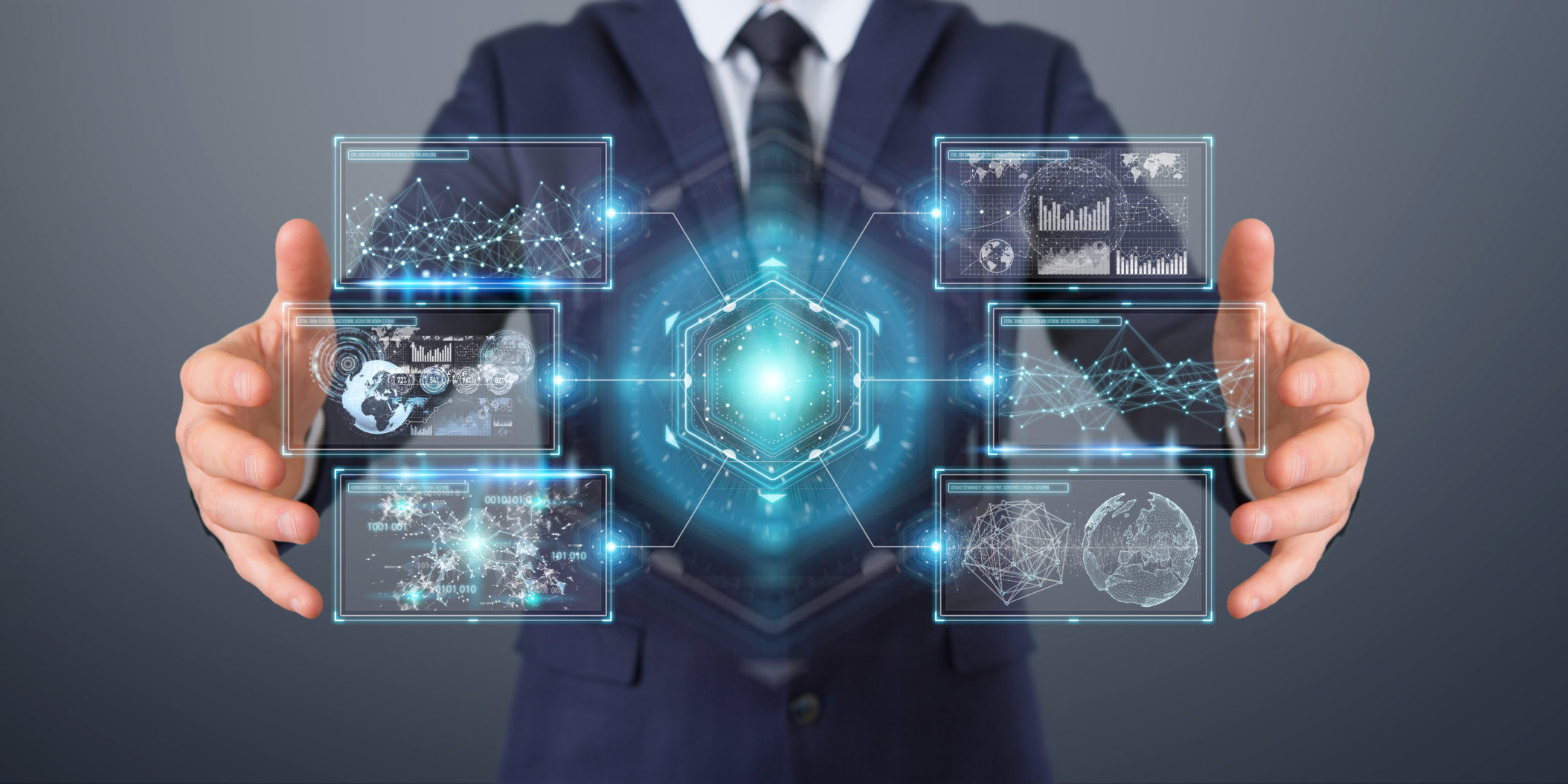 Businessman using digital screens interface with holograms datas